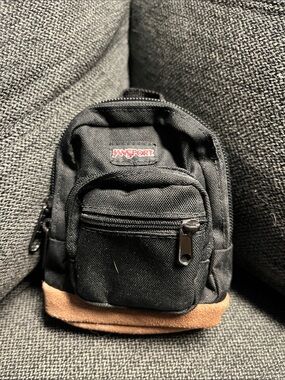 Jansport Black Mini Backpack with Brown Base